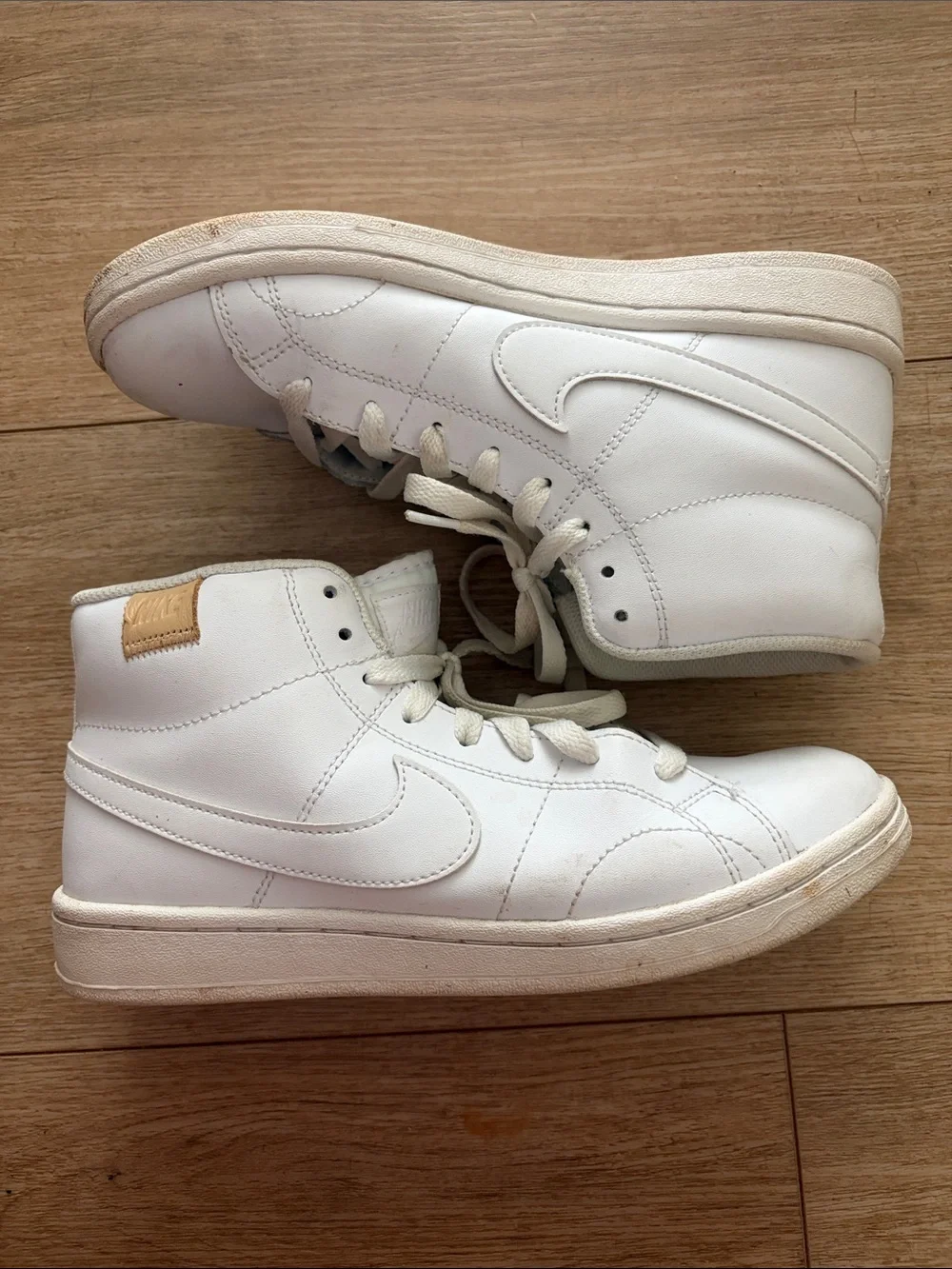 Women's White High-Top Nike Sneakers with Subtle Logo